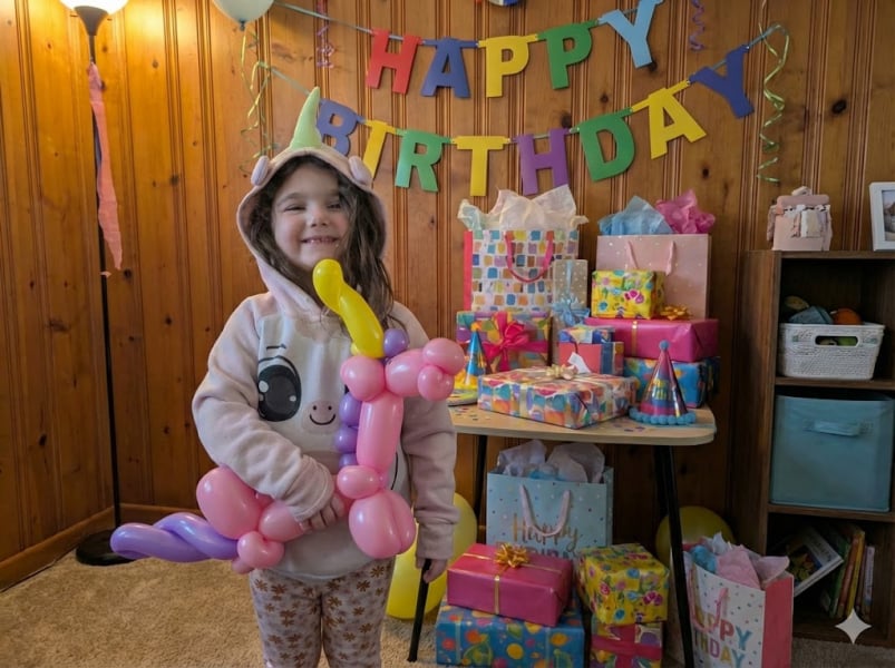 Girl with Balloon Animal at Birthday Party Hamilton Ontario